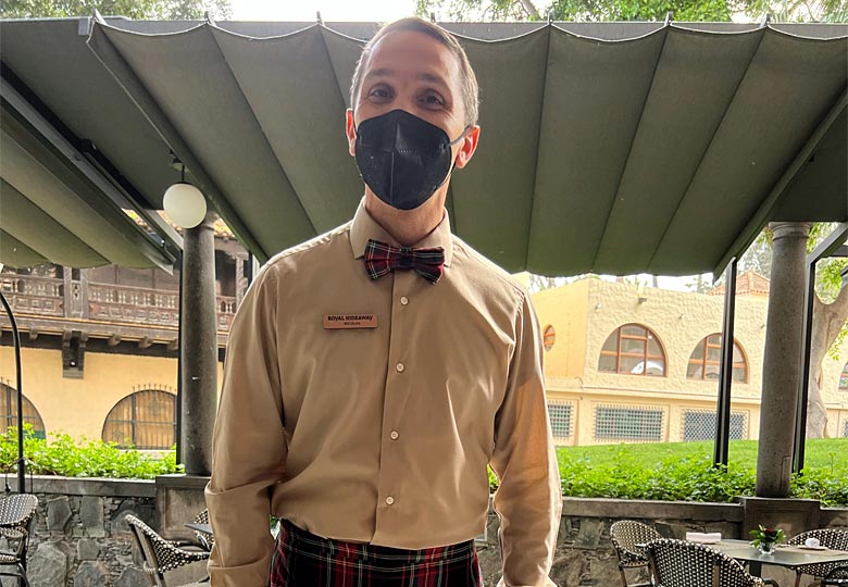 Being served by our friendly masked waiter, Nicholas, at 1890 La Bodeguita